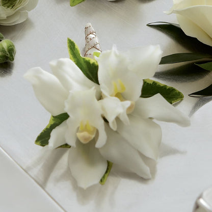 White Mini Cymbidium Boutonniere –  Heavenly Plants, Regina SK